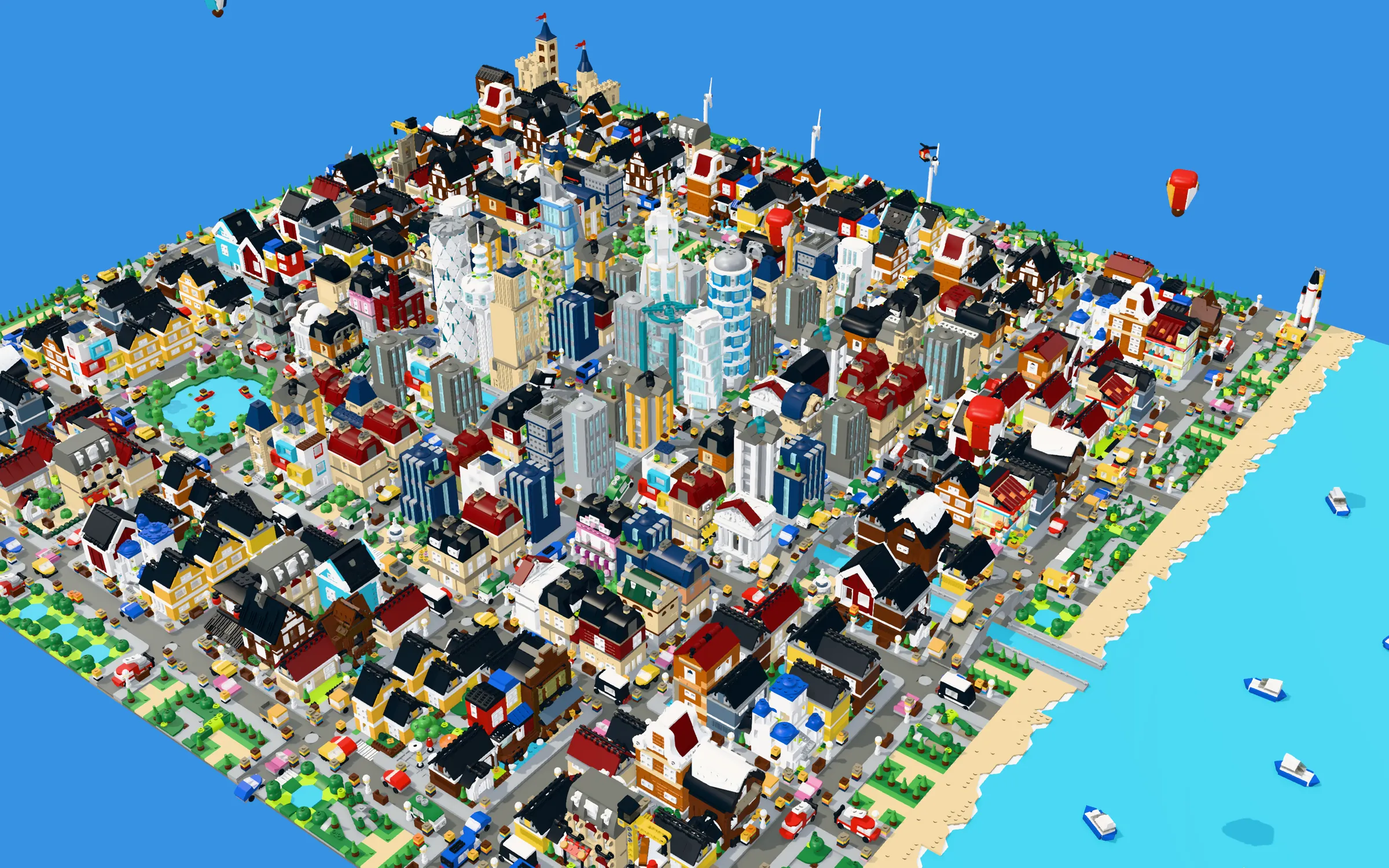 A whole Tiny Brick City from above: downtown towers, houses, a lake, a castle and a beach